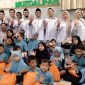 Pengurus Cabang TIDAR Sidoarjo bersama anak-anak Panti Asuhan Muzdalifah Waru Sidoarjo. (Foto: Syaiful/digitalJatim)