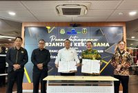 Penandatanganan Kerja Sama PT PWU Jatim dan Kejati Jatim Perkuat Pemulihan Aset.